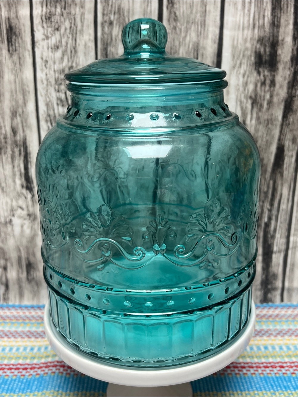 The Pioneer Woman “Cassie” glass Embossed Teal canister, large-80oz 6.25”X8”